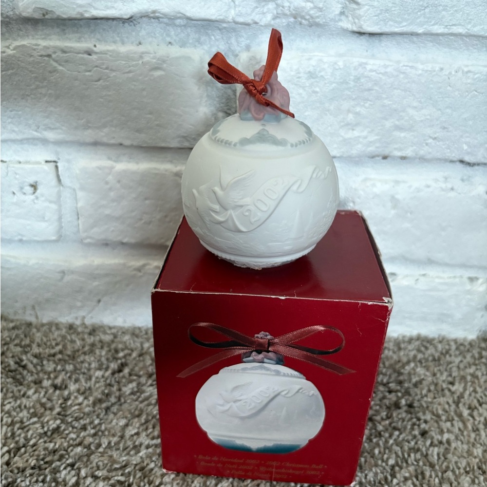 2002 White Lladro Ornament with Red Ribbon